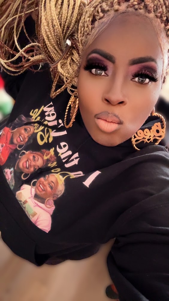 Bree wearing a black hoodie and matching lounge pants from the Kall Her Beauti I Am My Sista's Keeper Collection — comfortable plus size matching set designed for everyday wear, content creation, and errands, sizes S–5XL
